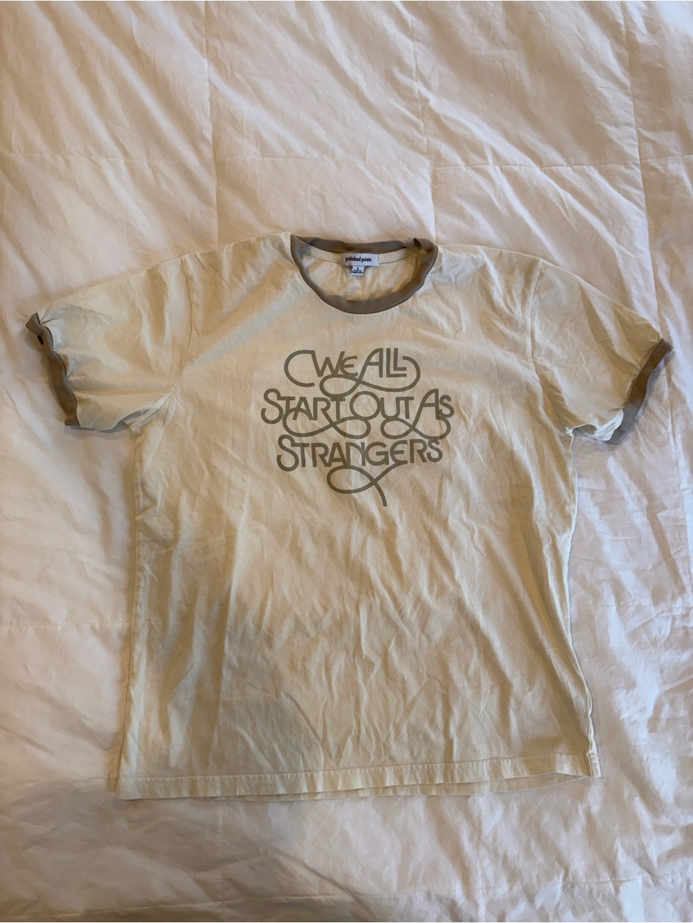 Graphic Ringer Tee in Cream with Olive Text